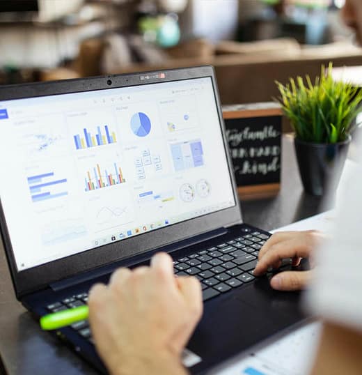 A business Analyst working from his computer